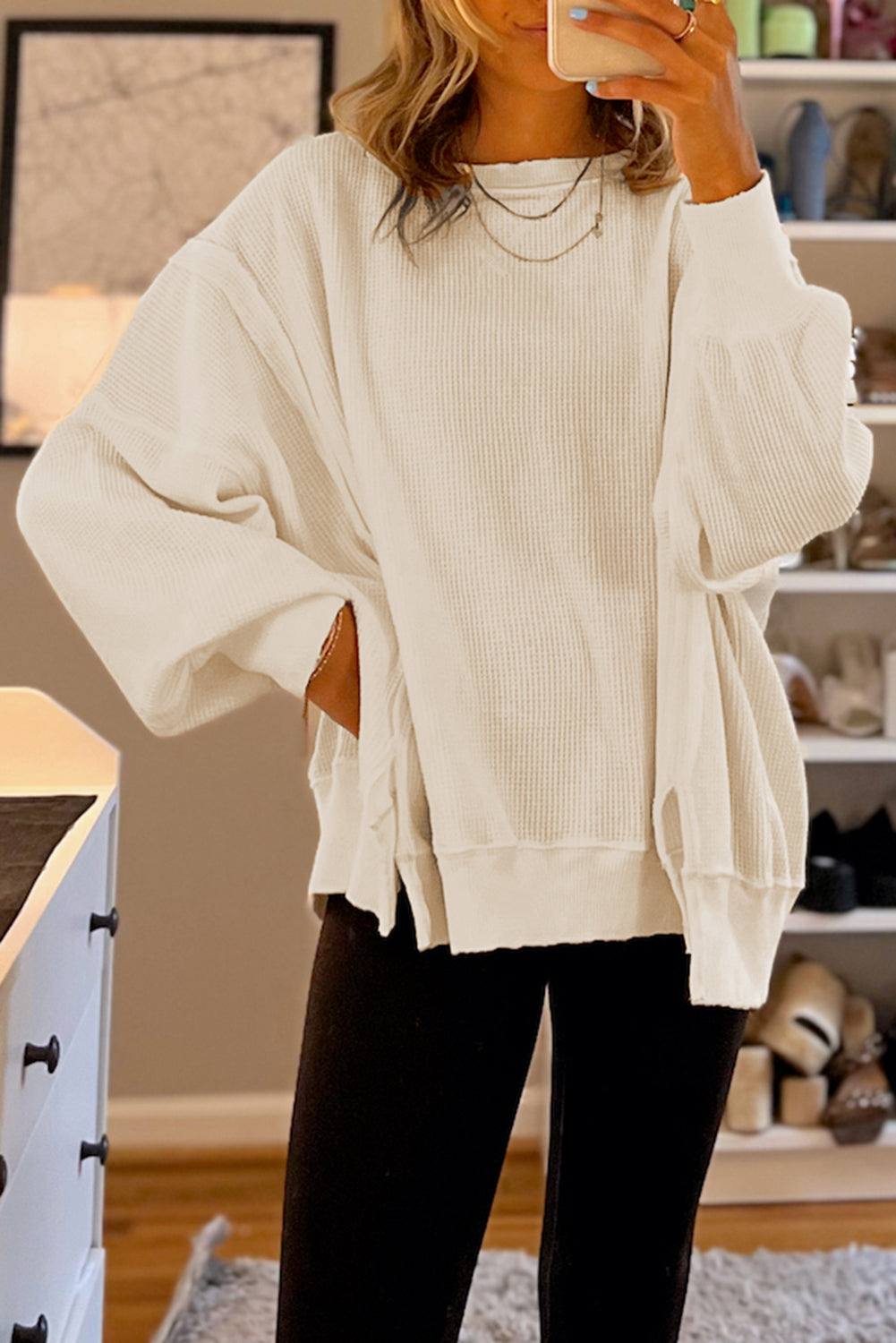 Wit wafelgebreid oversized sweatshirt met bisschopsmouwen en split
