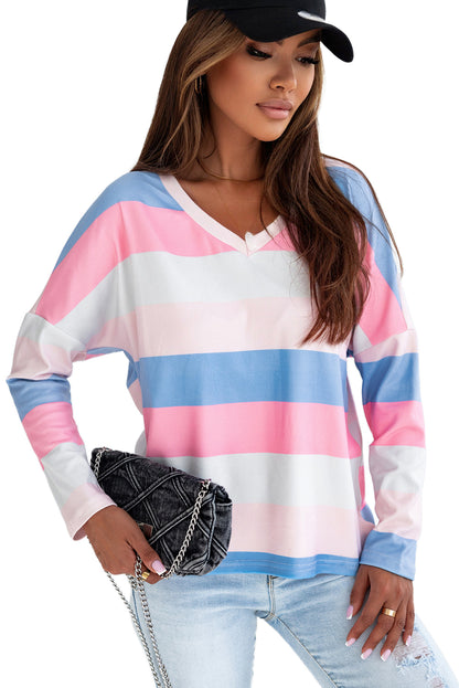 Roze contrasterende gestreepte top met V-hals en lange mouwen