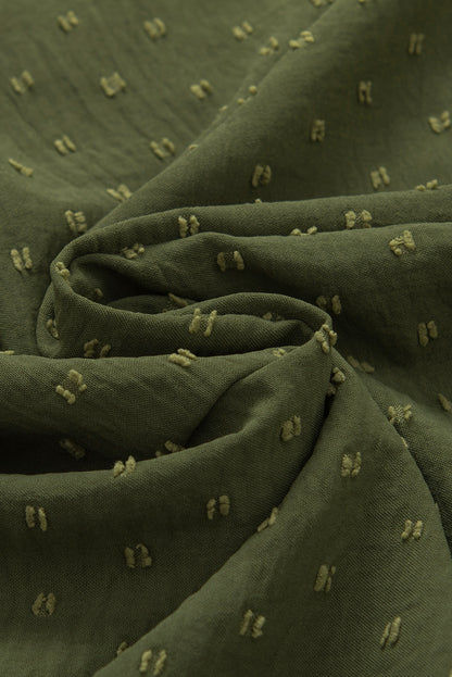 Mistgroene blouse met Zwitserse stippen en vleermuismouwen