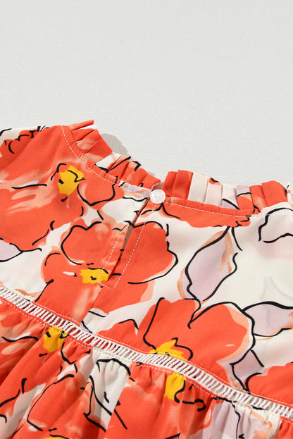 Oranje bloemen losse blouse met bubbelmouwen en ruches aan de hals
