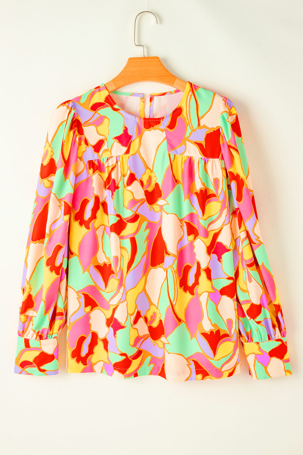 Gele blouse met abstracte print en pofmouwen