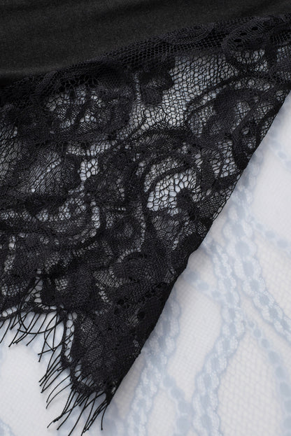 Zwarte babydoll-top met kanten mouwen en V-hals en ruches