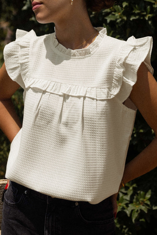 Witte vaste kleur ruches trim wafel gebreide blouse
