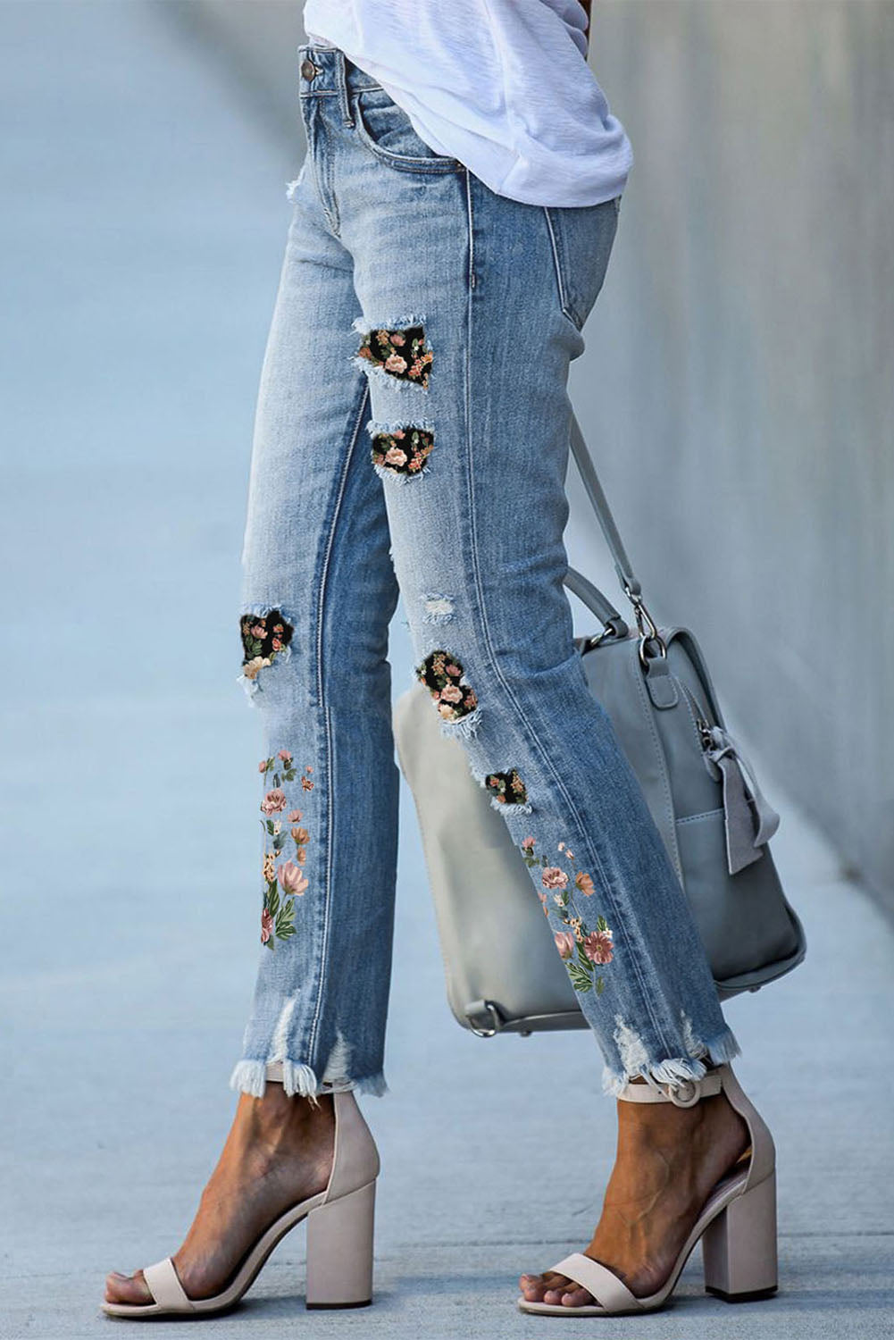 Hemelsblauw gescheurde skinny jeans met print en patch