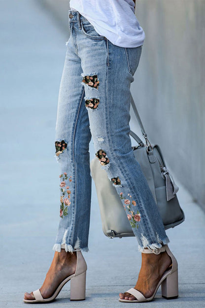 Hemelsblauw gescheurde skinny jeans met print en patch