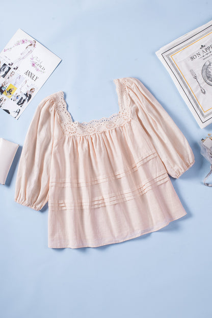 Beige babydollblouse met pofmouwen en oogjes