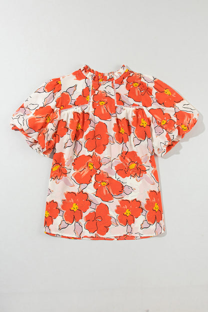 Oranje bloemen losse blouse met bubbelmouwen en ruches aan de hals