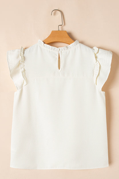 Witte vaste kleur ruches trim wafel gebreide blouse