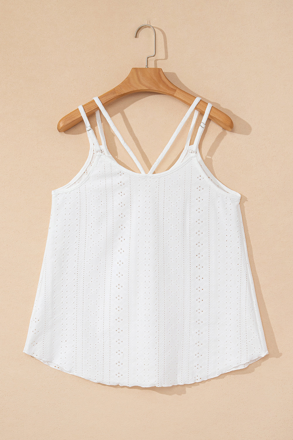 Witte tanktop met ronde hals en oogjes met bandjes