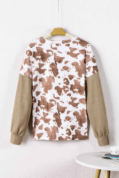 Lichtkaki Henley-blouse met dierenprint en getextureerde patch en lantaarnmouwen