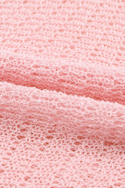 Roze gebreide top met ronde hals en lange mouwen