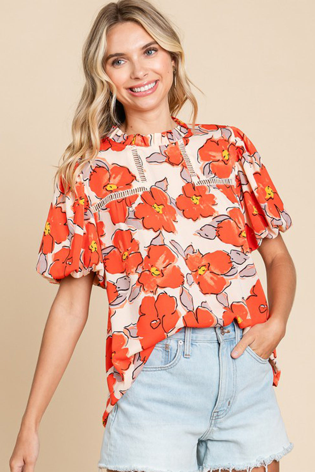 Oranje bloemen losse blouse met bubbelmouwen en ruches aan de hals