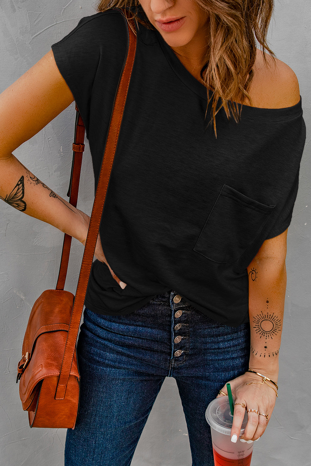 Zwart T-shirt met zakken en zijsplitten