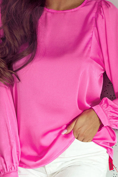 Roze satijnen blouse met ronde hals en lange mouwen