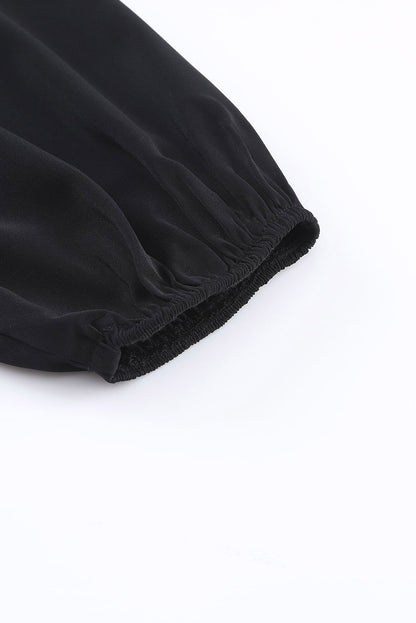 Zwart geknoopte asymmetrische off-shoulder blouse