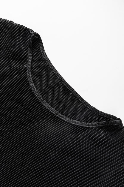 Zwarte cropped trui met koord en broek met wijde pijpen