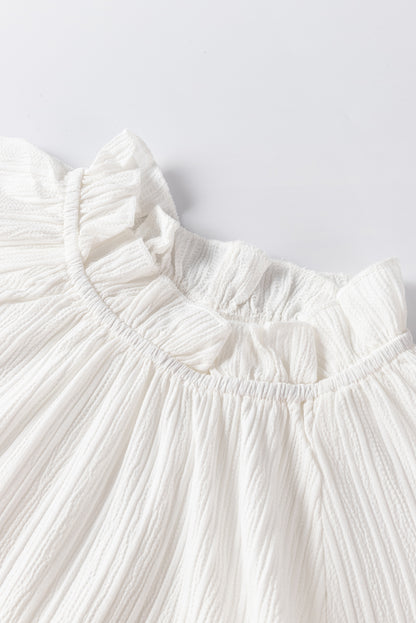 Witte blouse met ruches en rimpelige bubbelmouwen met ruches