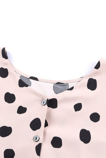 Oversized blouse met roze knopen en ruches aan de manchetten