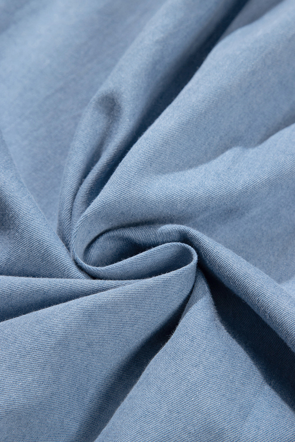 Beau blauwe retro chambray top met geplooide knoopsluiting op de rug