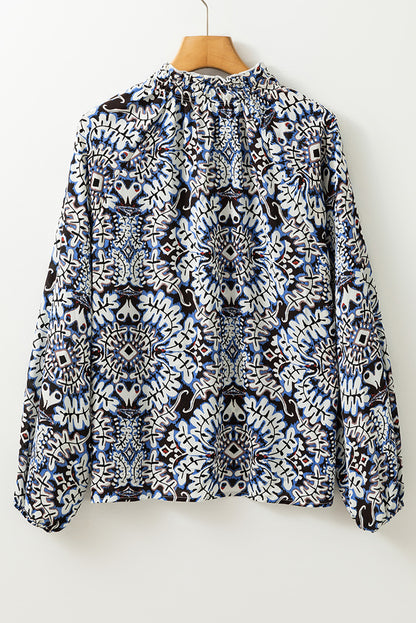 Blauwe tribale afdruk vaarten met fronvilde nek puff mouw blouse