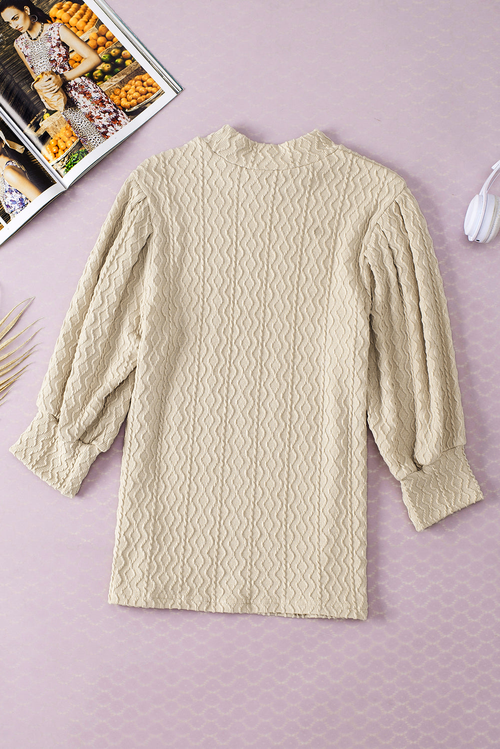 Abrikoos vintage getextureerde top met pofmouwen en nephals