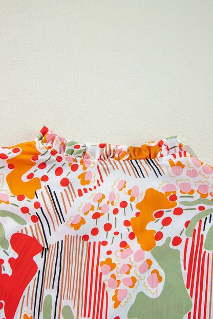 Oranje bedrukte blouse met V-hals en pofmouwen