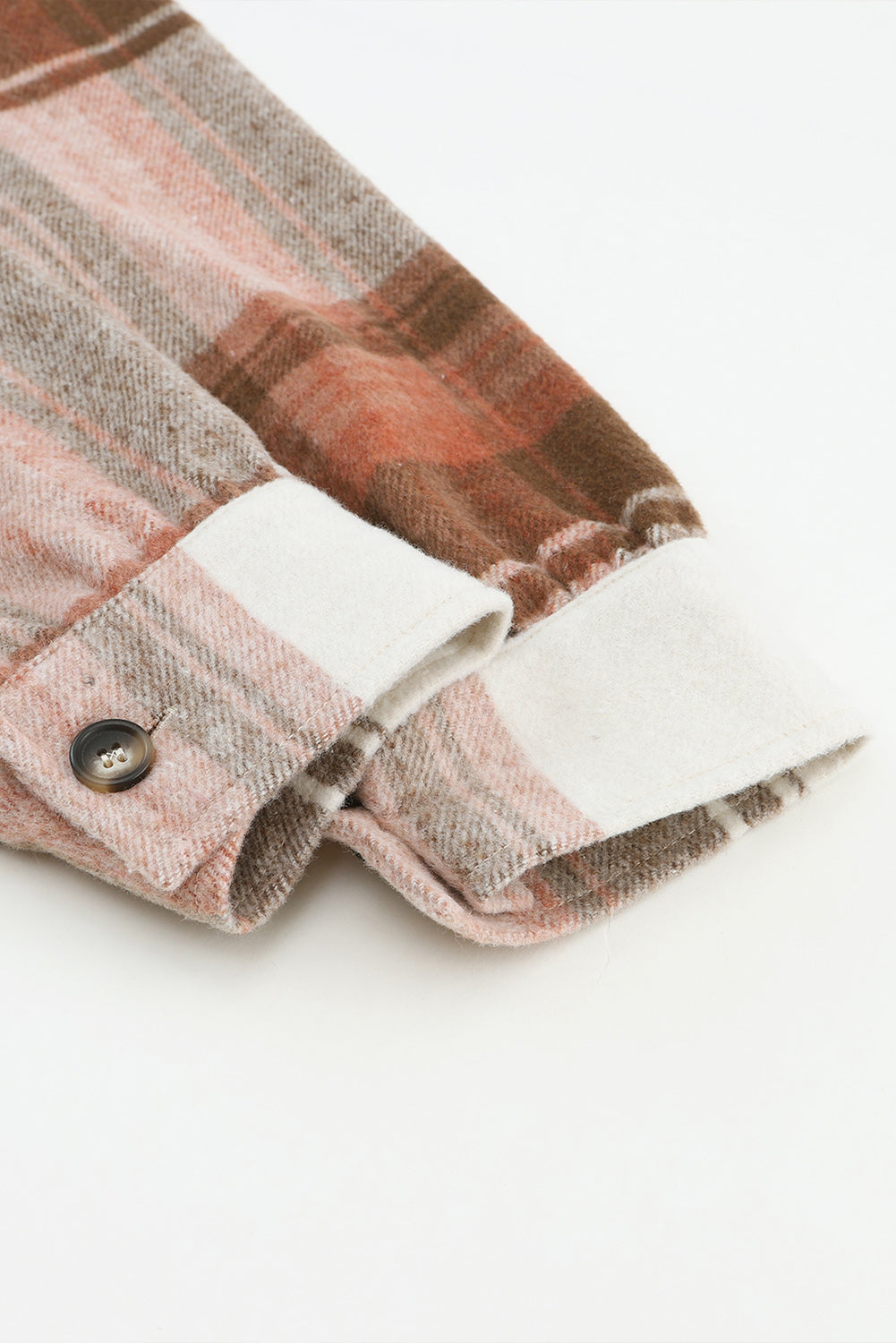 Bruine geruite print met klepzakken en lange shacket