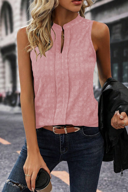 Roze tanktop met splithals en traliestructuur