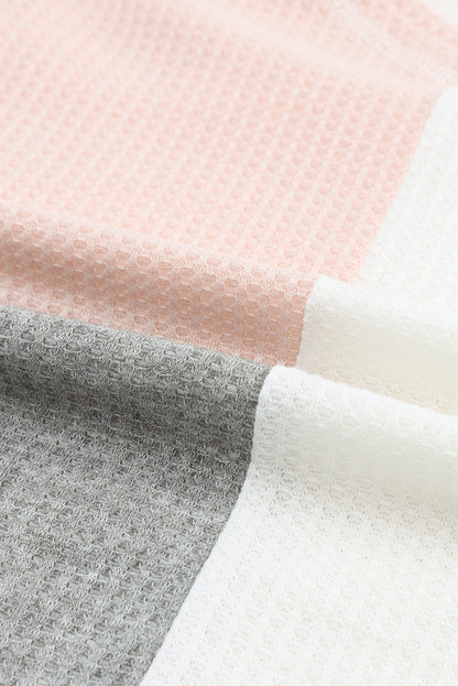Oversized top met veelkleurige wafelkleurblokken en wijde mouwen