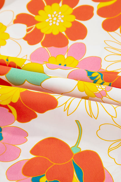 Oranje blouse met abstracte print en V-hals en halve mouw