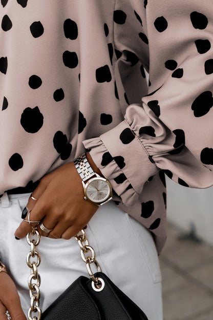 Oversized blouse met roze knopen en ruches aan de manchetten