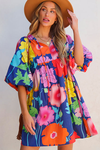 Donkerblauwe bloemenprint split nek babydoll jurk