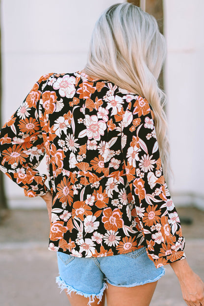 Bruine babydollblouse met 3/4 mouwen en bloemenprint