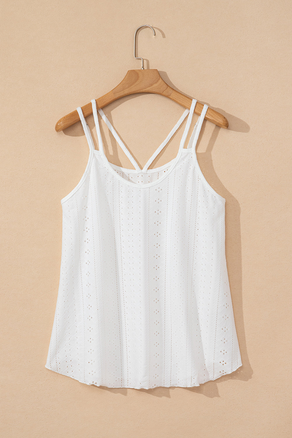 Witte tanktop met ronde hals en oogjes met bandjes