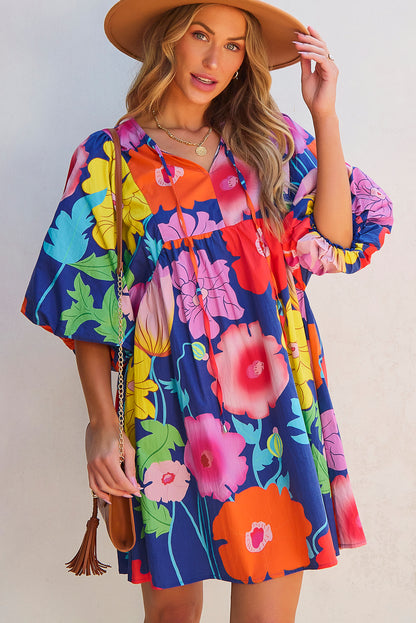 Donkerblauwe bloemenprint split nek babydoll jurk