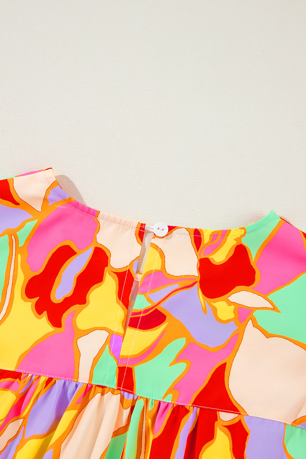 Gele blouse met abstracte print en pofmouwen