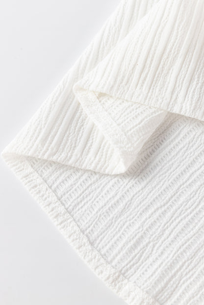 Witte blouse met ruches en rimpelige bubbelmouwen met ruches