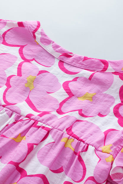 Babydoll-blouse met roze bloemen en ruches aan de mouwen