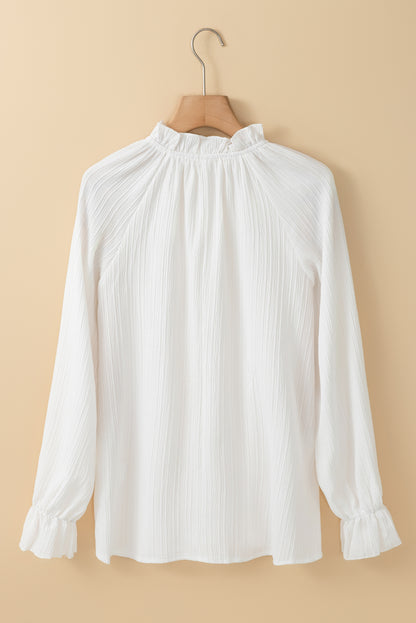 Witte blouse met ruches en rimpelige bubbelmouwen met ruches