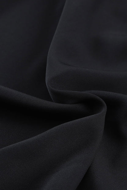 Zwart geknoopte asymmetrische off-shoulder blouse