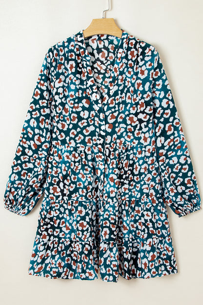 Blauwe overhemdjurk met ruches en luipaardprint met bubbelmouwen
