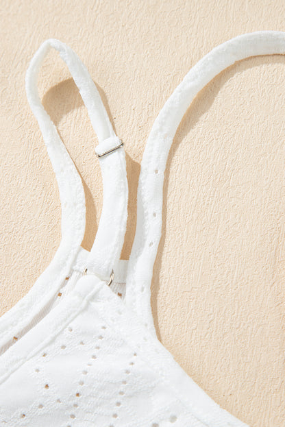 Witte tanktop met ronde hals en oogjes met bandjes
