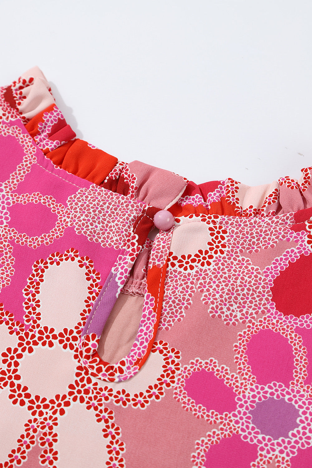 Tanktop met geborduurde details en bloemenprint met ruches