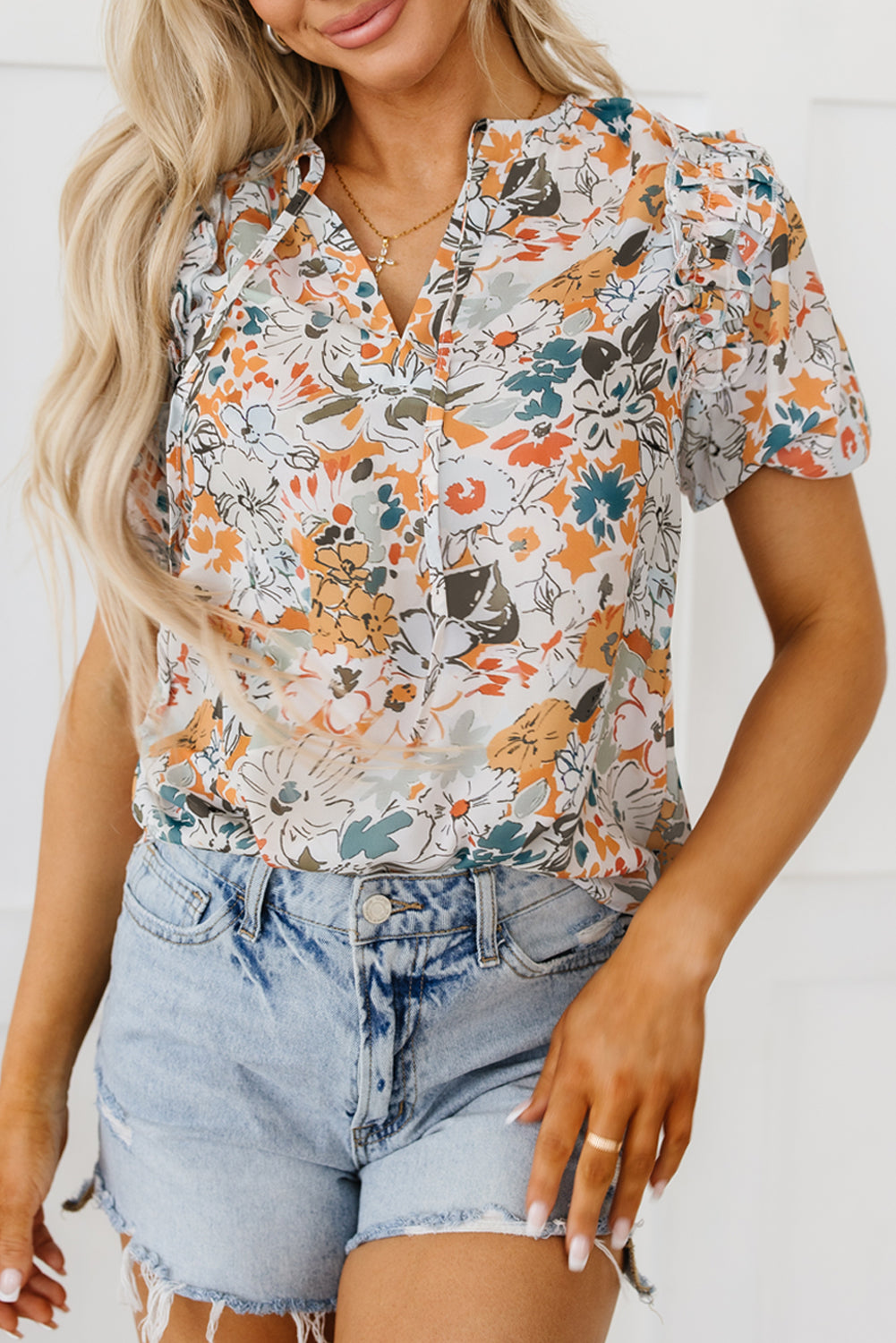 Veelkleurige blouse met split en V-hals, pofmouwen en bloemenprint