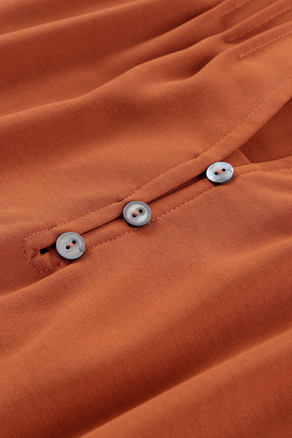 Oranje geplooide geplooide blouse met V-hals en knopen