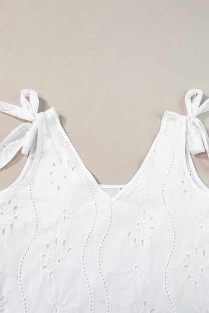 Witte tanktop met geknoopte bandjes en V-hals met borduurmotief