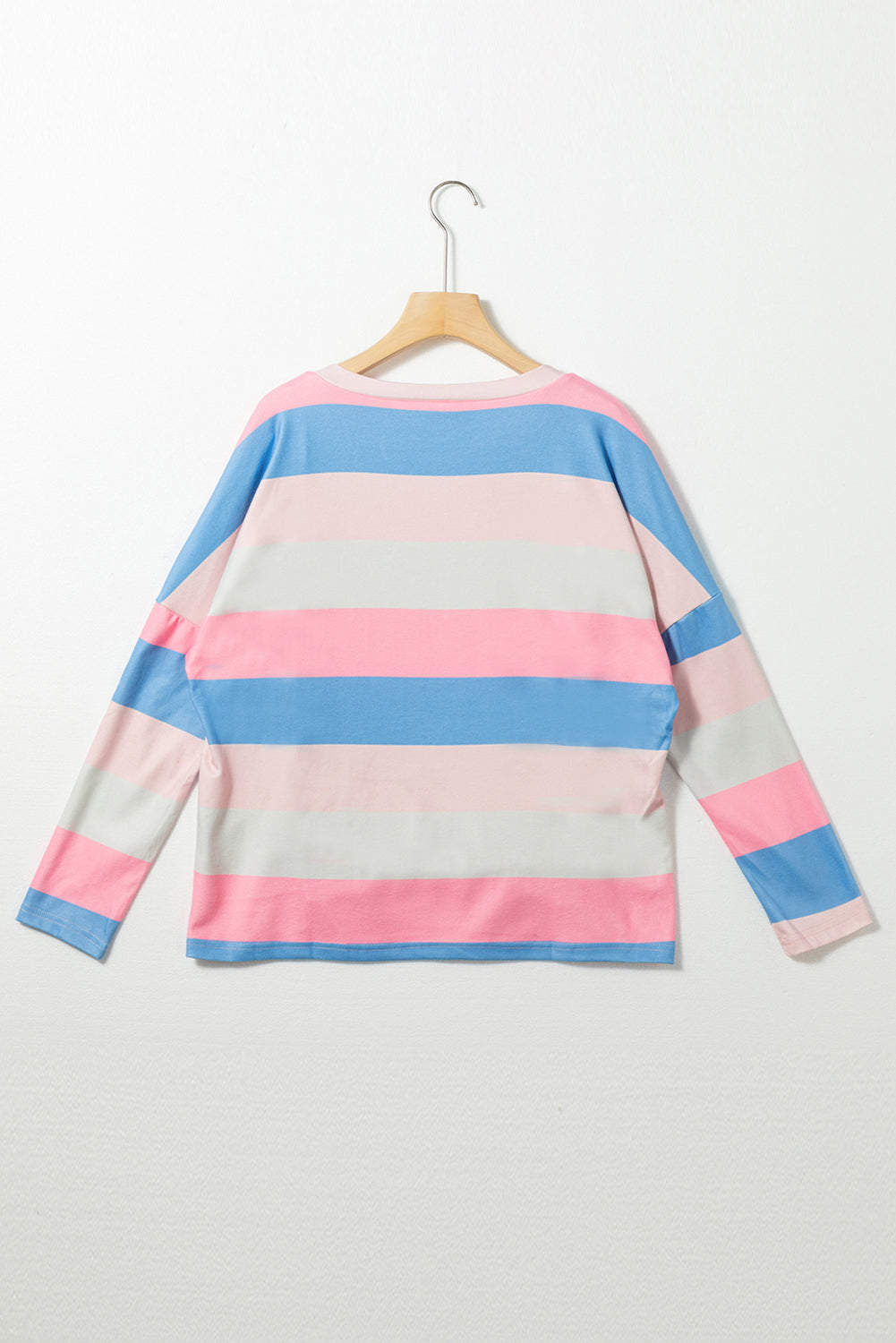 Roze contrasterende gestreepte top met V-hals en lange mouwen