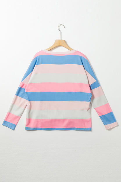 Roze contrasterende gestreepte top met V-hals en lange mouwen