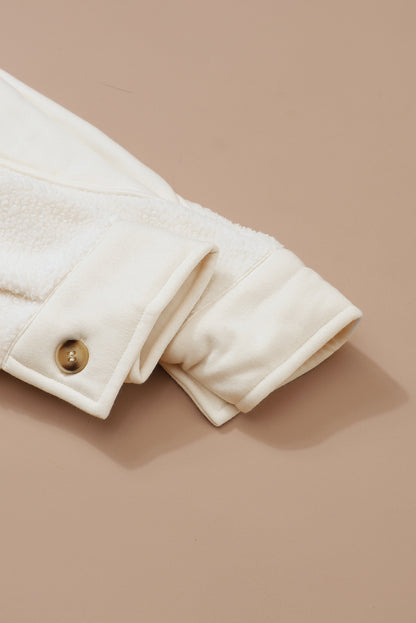 Beige gestikte zak met knoopsluiting en onafgewerkte zoom