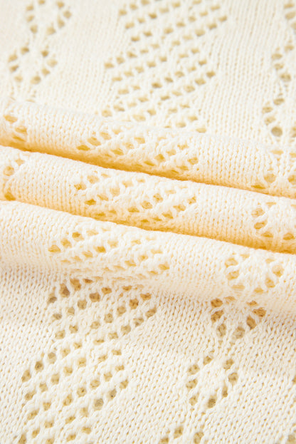 Beige uitgehold patroon gebreide korte puff mouw trui